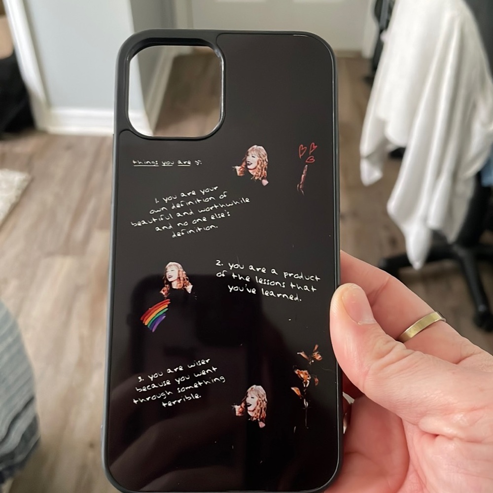 Taylor swift iPhone 12 case it’s in good  condition